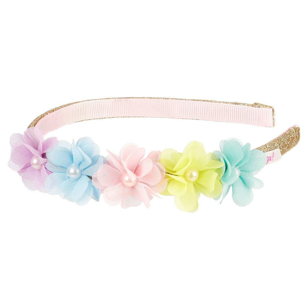 Child's headband adorned with pastel fabric flowers
