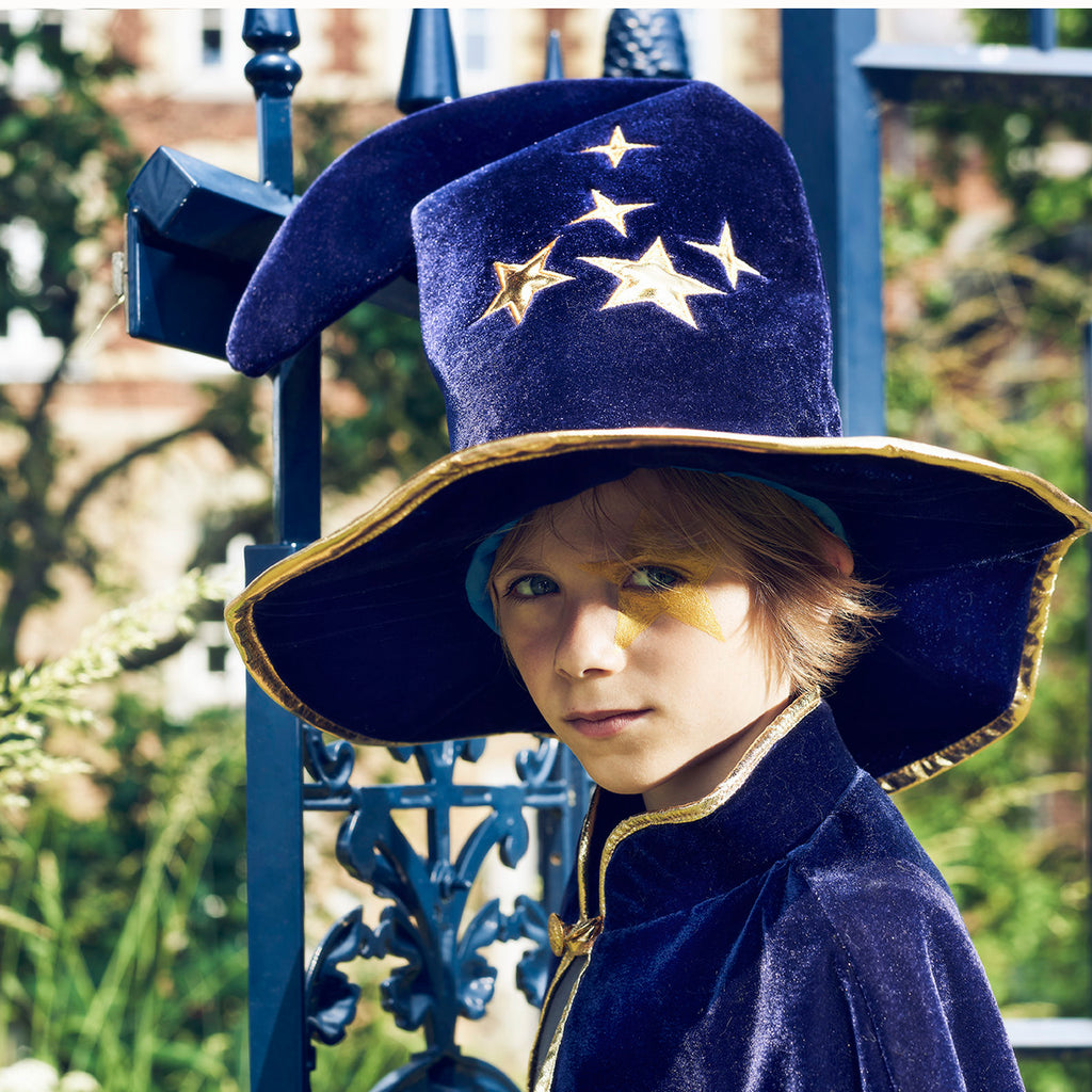 Childs tall purple velvet wizard hat with wide brim. Decorated with gold stars.