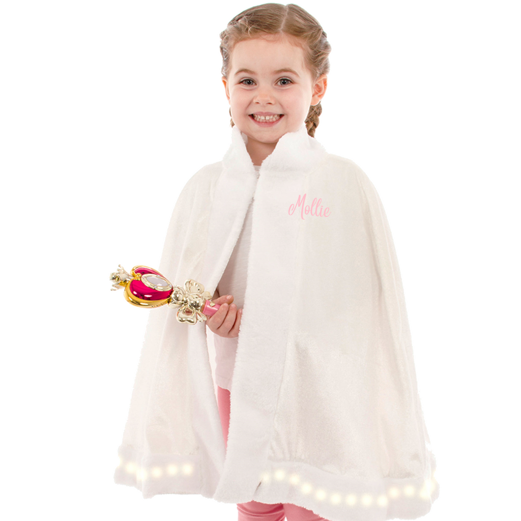 Child's velour cape with faux fur trim and LED lights. Personalised with child's name