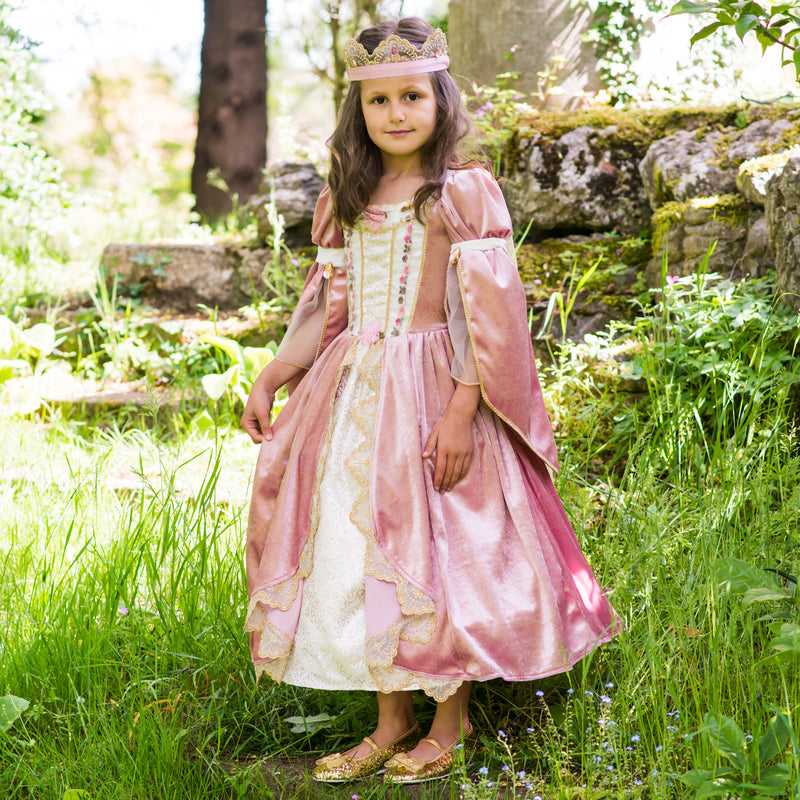 Child's full length pink princess dress with embellished bodice, flowing sleeves and matching crown.