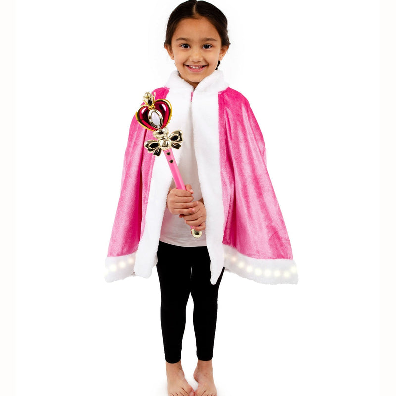 Child's pink velour cape with faux fur trim and LED lights around the hem.